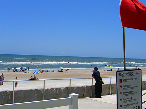 beach high hazard at pier photo