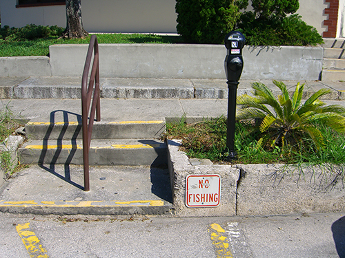 No Fishing sign on Menendez Ave.