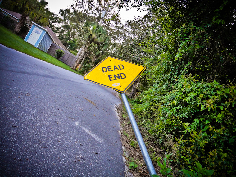 Picture of bent woodlawn street dead end sign in St Augustine Florida