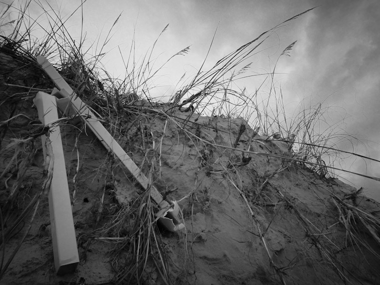 Photo of dune fence post erosion in Saint Augustine Beach