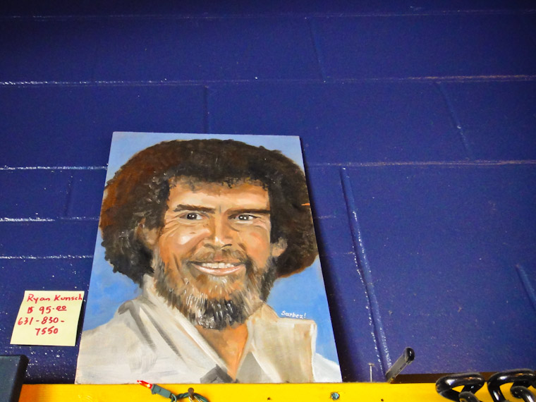 Photo of a happy Bob Ross Painting