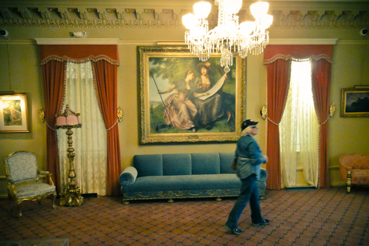 Picture of visitor nehind velvet rope at Flagler College