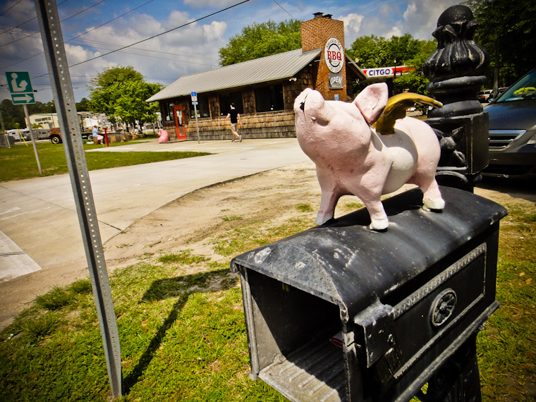 Mailbox with flying pig on top at bbq joint