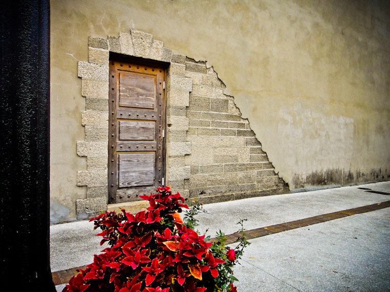 Doorway and poinsettia on Aviles Street