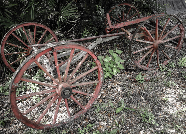 Old red wagon wooden wheels at Florida Agricultural museum