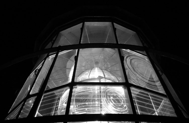 Lighthouse lens at night