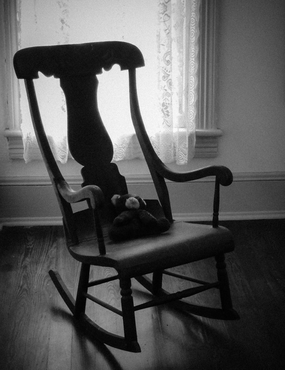 Teddy bear and rocking chair at Dow Museum of historic houses