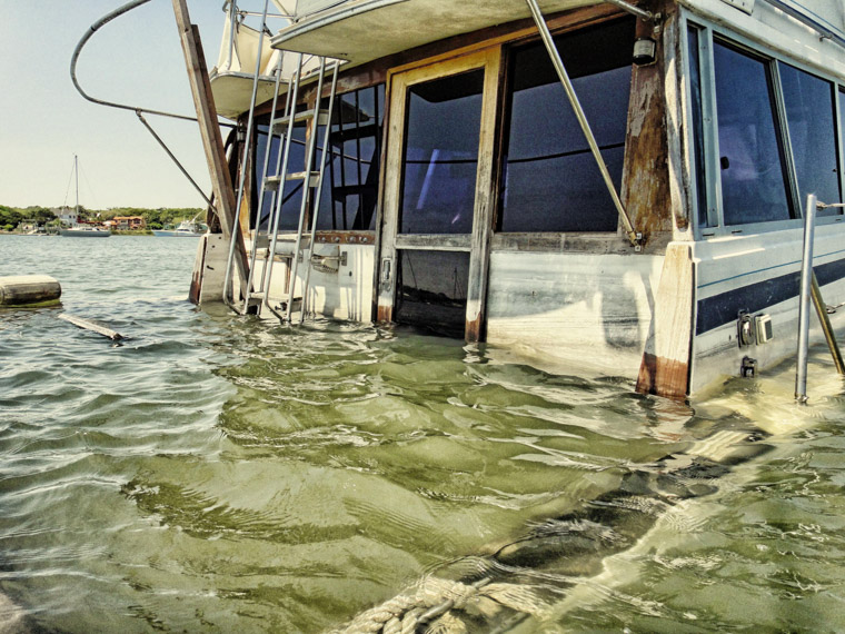 Sinking boat in inlet