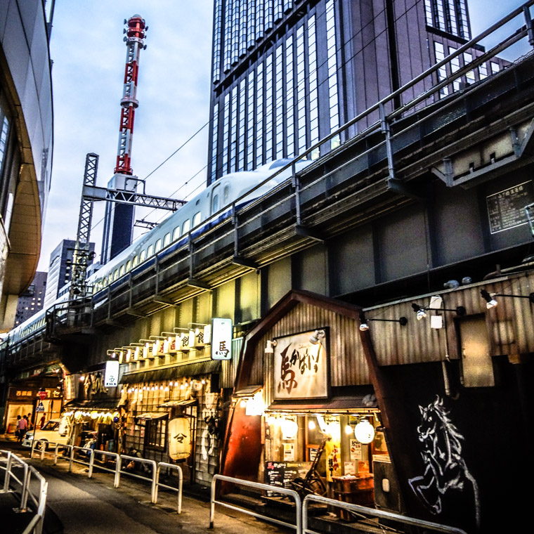 Tokyo Japan bullet train over restaurant