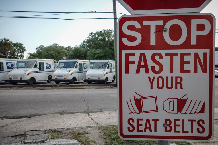 USPS mail truck fasten seat belt sign