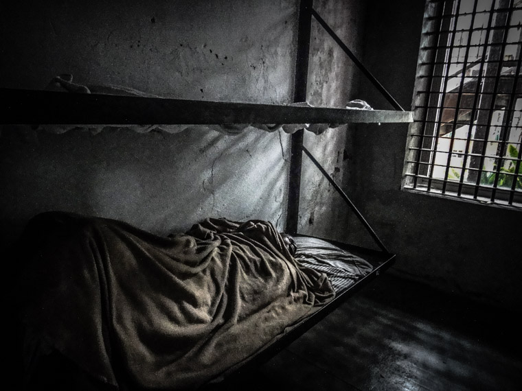 Old prison jail cell bunk