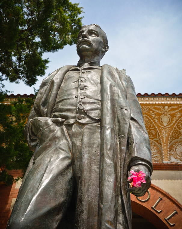 Henry Flagler Sculpture with hibiscus flower