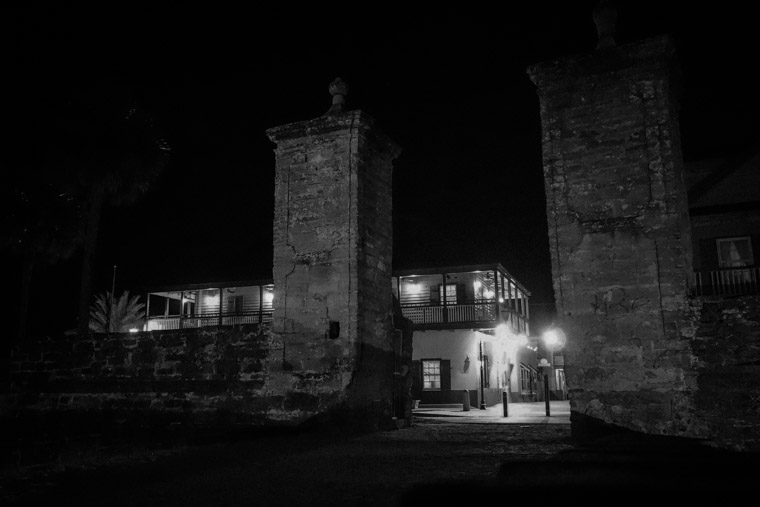 City gates at night