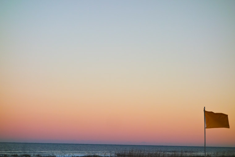 Beach sunset flag