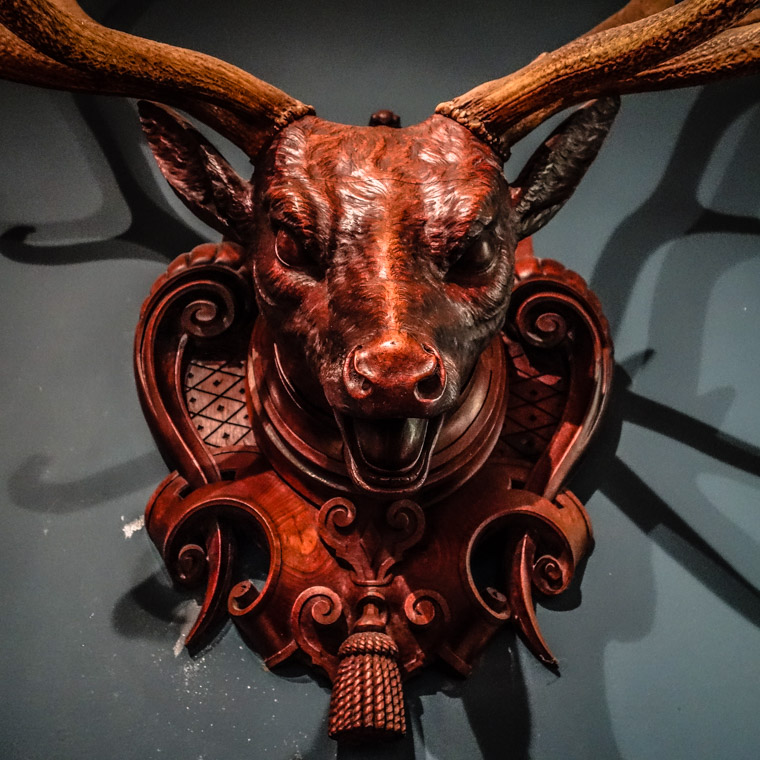 Lightner museum wood deer carving