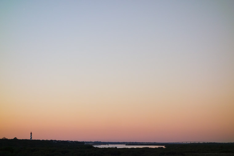 Lighthouse sunset skyline